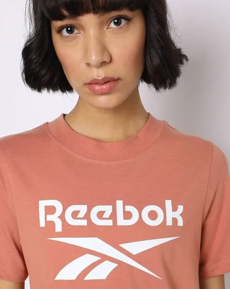 T-shirt coral pour femmes REEBOK avec grand logo IDENTITY